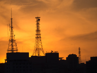 antenna towers at beautiful sunset
