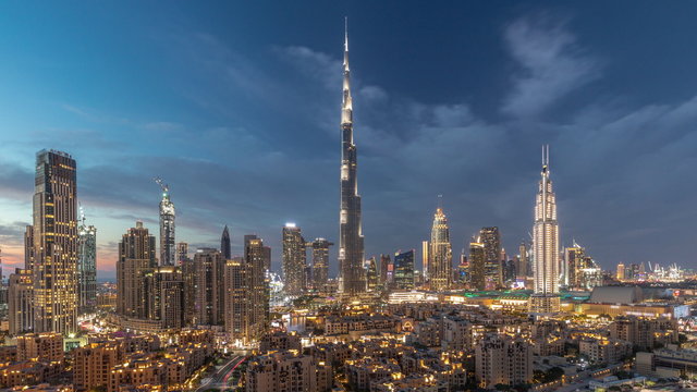 Dubai Downtown skyline day to night timelapse with Burj Khalifa and other towers paniramic view from the top in Dubai © neiezhmakov