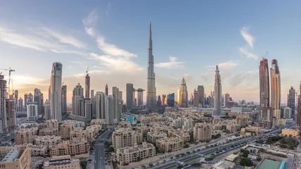 Foto op Canvas Dubai Downtown skyline day to night timelapse with Burj Khalifa and other towers paniramic view from the top in Dubai © neiezhmakov