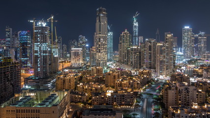 Beautiful skyline of Dubai downtown and Business bay with modern architecture night timelapse.