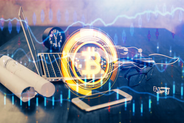 Double exposure of blockchain and crypto economy theme hologram and table with computer background. Concept of bitcoin cryptocurrency.