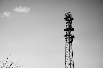 Black and white landscape picture of a telecomunication antenas