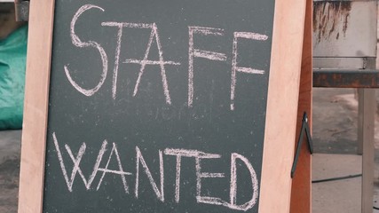 Staff wanted chalk board sign. Vacancy sign on black chalkboard. Headhunter concept. Job hire concept. - Powered by Adobe