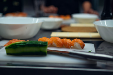 fresh sushi preparation, smoked salmon