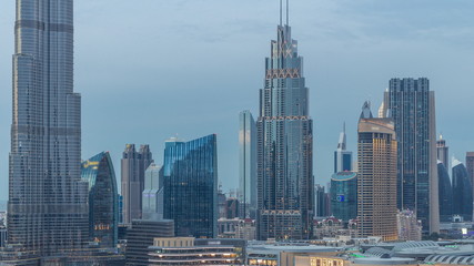 Dubai Downtown skyline during sunset timelapse towers paniramic view from the top in Dubai
