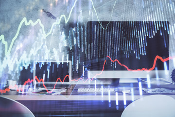 Double exposure of graph and financial info and work space with computer background. Concept of...