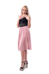 Astonished young blonde stylish surprised woman looking at camera. Discount concept. Full body isolated on white background. 