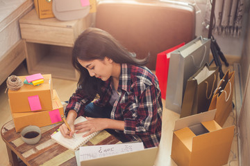 Small business online shopping, Social media marketing working at home, Asian woman working with computer laptop for shopping online.