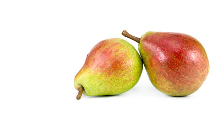 green-red pear on white background, close-up, copy space.