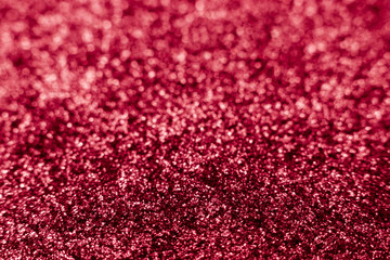 Obraz premium Pink glitter texture Festive sparkling sequins background closeup. Wpaper for Valentine, New Year or Christmas Holidays.