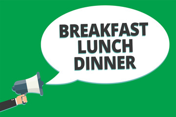 Handwriting text Breakfast Lunch Dinner. Concept meaning eating your meals at different period of day Message idea information text public loud speaker green plane background