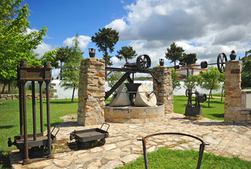 Old olive oil mill at the entrance of the village Casas de Don Antonio, Cáceres province,...