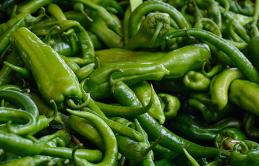Green pepper pods on the counter of the oriental market. Concept - Oriental Spices
