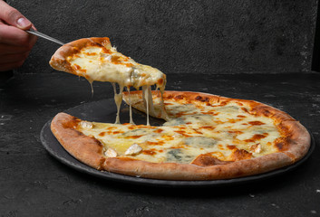 cheese pizza on black background