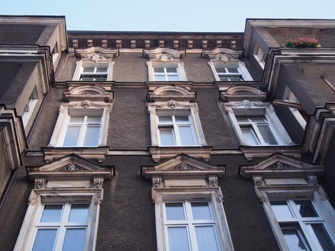 Old European Apartment Building  sculpted decorations and white window frames, classism (Szczecin Poland)