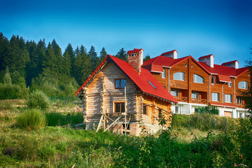 The construction of a beautiful house in the forest.