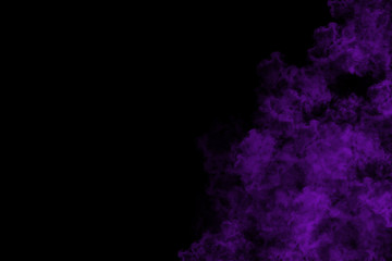 abstract colored dust explosion on a black background.abstract powder splatted background.