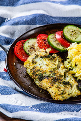 Fish dish - fried cod fillet and vegetables