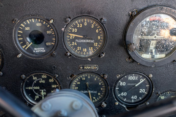 Cockpit of an old soviet propeller airplane.