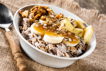 Porridge with nuts, fruits and honey