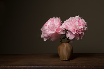 Still life with blooming peony roses in fine art style