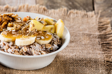 Porridge with nuts, fruits and honey