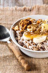 Porridge with nuts, fruits and honey