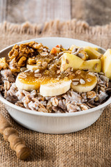 Porridge with nuts, fruits and honey