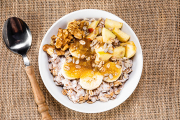 Porridge with nuts, fruits and honey