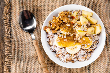Porridge with nuts, fruits and honey