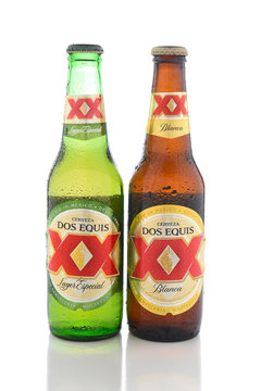 IRVINE, CA - JUNE 14, 2017: Dos Equis Blanca and Especial. Two bottles the beer from Cuauhtemoc-Moctezuma Brewery in Monterrey, Mexico a subsidiary of Heineken International.