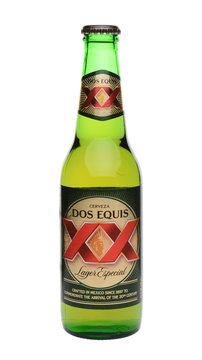 IRVINE, CA - MAY 27, 2014: A single Bottle of Dos Equis Lager Especial on white. Founded in 1890 from the Cuauhtemoc-Moctezuma Brewery in Monterrey, Mexico a subsidiary of Heineken International.