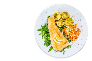 Fish dish - fried fish fillet boiled potatoes and vegetables