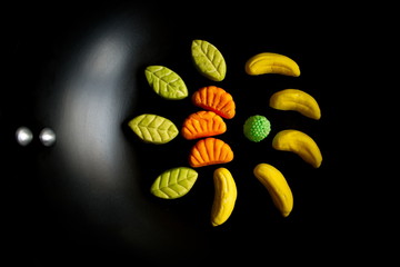 Fruit candy on black. Delicious fruit candy. Multicolored fruit candy. - 282927840