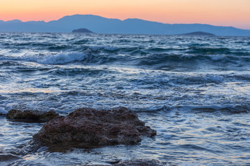Long exposure seascape of Mediterranean Sea, at sunset.