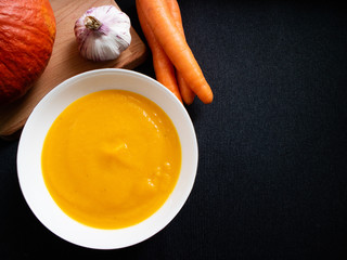Vegetable cream made with organic products like pumpkin, carrot, onion and courgette