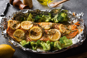 grilled whole salmon fillet with lemon and rosemarry