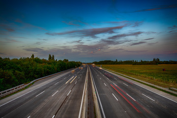 busy highway traffic during the summer night