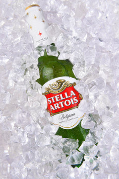 IRVINE, CALIFORNIA - MARCH 29, 2018: Stella Artois Beer on Ice. Stella has been brewed in Leuven, Belgium, since 1926, and launched as a festive beer, named after the Christmas star.