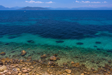Fototapeta na wymiar The clear and blue waters of Mediterranean sea in the Saronic gulf, Greece.
