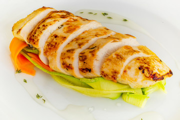 Delicious cut grilled meat on white background, top view