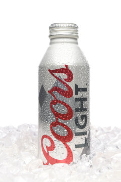 IRVINE, CALIFORNIA - APRIL 15, 22019: Coors Light Aluminum Pint Bottle standing in a bed of ice.