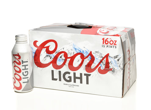IRVINE, CALIFORNIA - APRIL 15, 22019: A 15 count package of Coors Light Aluminum Pint Bottles on white with reflection. One Bottle is outside the package.