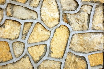 Decorative stone wall pattern of different size.