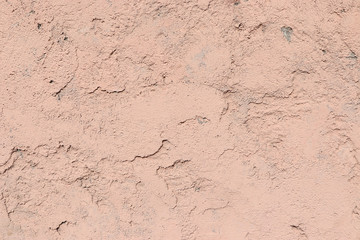 Old stone wall with cracks, natural concrete background, old natural texture of an ancient stone. It is used for decoration of buildings and embankments, a wonderful background for the desktop 