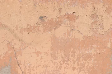 Deurstickers Verweerde muur Oude stenen muur met scheuren, natuurlijke betonnen achtergrond, oude natuurlijke textuur van een oude steen. Het wordt gebruikt voor de decoratie van gebouwen en taluds, een prachtige achtergrond voor de desktop