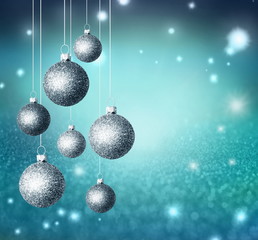 Christmas abstract background with blue glistening balls.