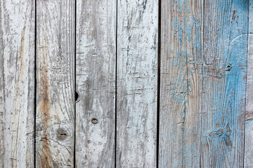 Rustic wooden background with remains blue paint