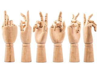 hand of wood doll make fingers to touch on white bakground