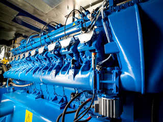 Engine of CHP unit. Diesel and gas industrial electric generator. - obrazy, fototapety, plakaty